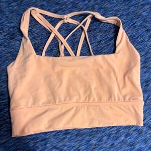 Buffbunny used revolution sports bra. Size medium. Cup pads NOT included